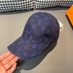 Louis Vuitton monogram baseball cap in dark blue, curved brim and front emblem detail