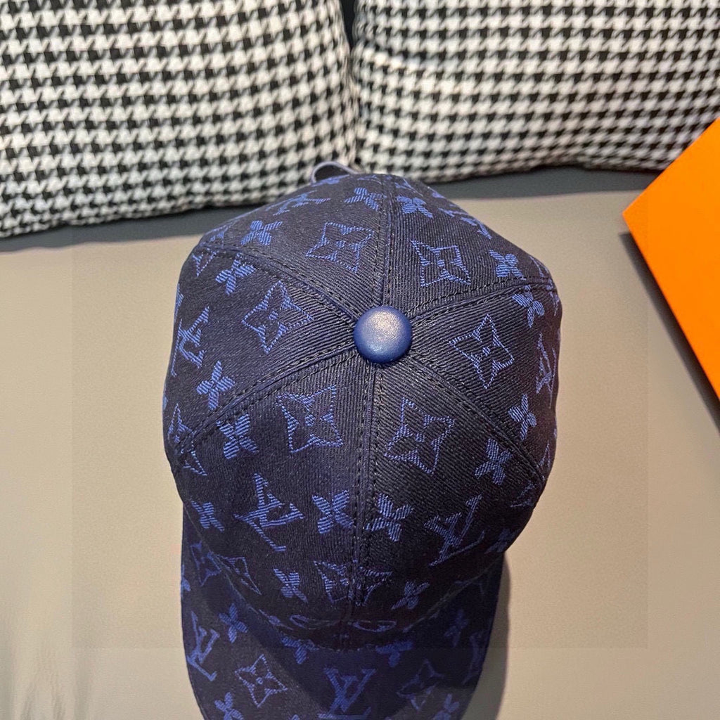 Louis Vuitton monogram baseball cap, dark blue top view with stitched logo marks