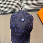 Louis Vuitton monogram baseball cap, dark blue top view with stitched logo marks