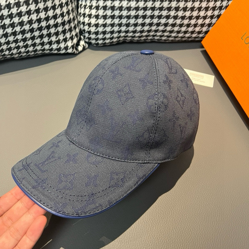 Louis Vuitton monogram denim cap in navy blue, curved brim and textured LV pattern