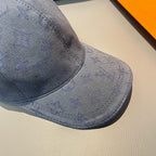 Louis Vuitton monogram denim cap in navy blue, textured LV pattern on brim