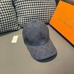 Louis Vuitton monogram denim cap in navy blue, front panel with LV pattern and blue button