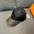 Black and brown baseball cap with monogram print, button top
