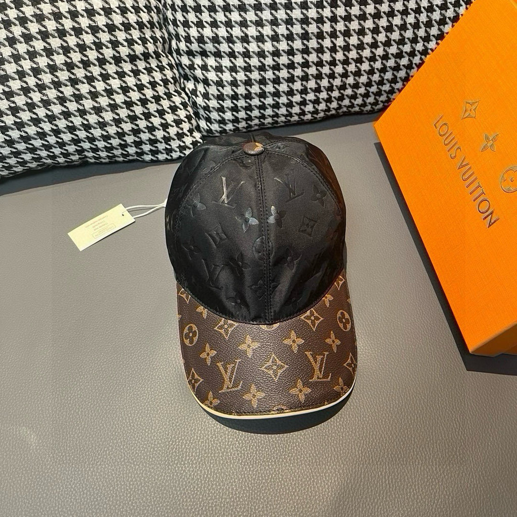 Black baseball cap with monogram print and contrasting brown logo brim
