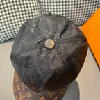 Black monogram baseball cap crown with stitched center and gold button