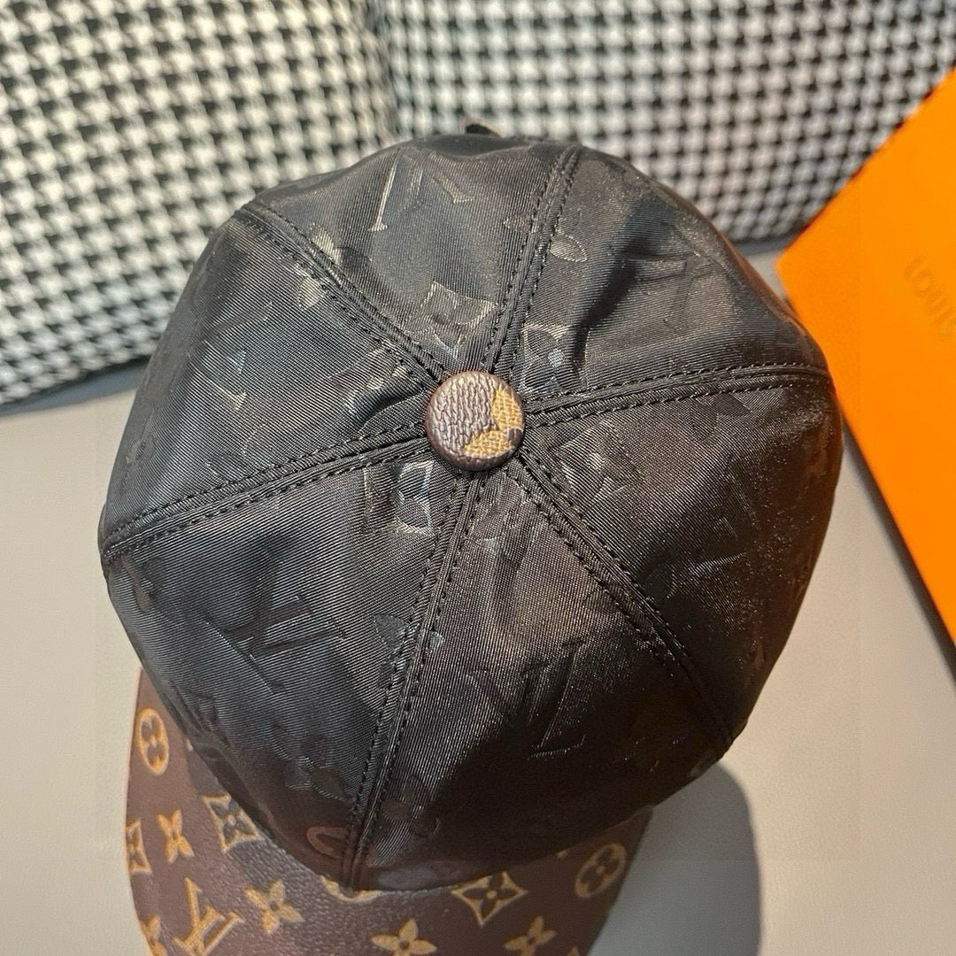 Black monogram baseball cap crown with stitched center and gold button