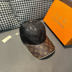 Black-and-brown baseball cap with monogram pattern and curved brim