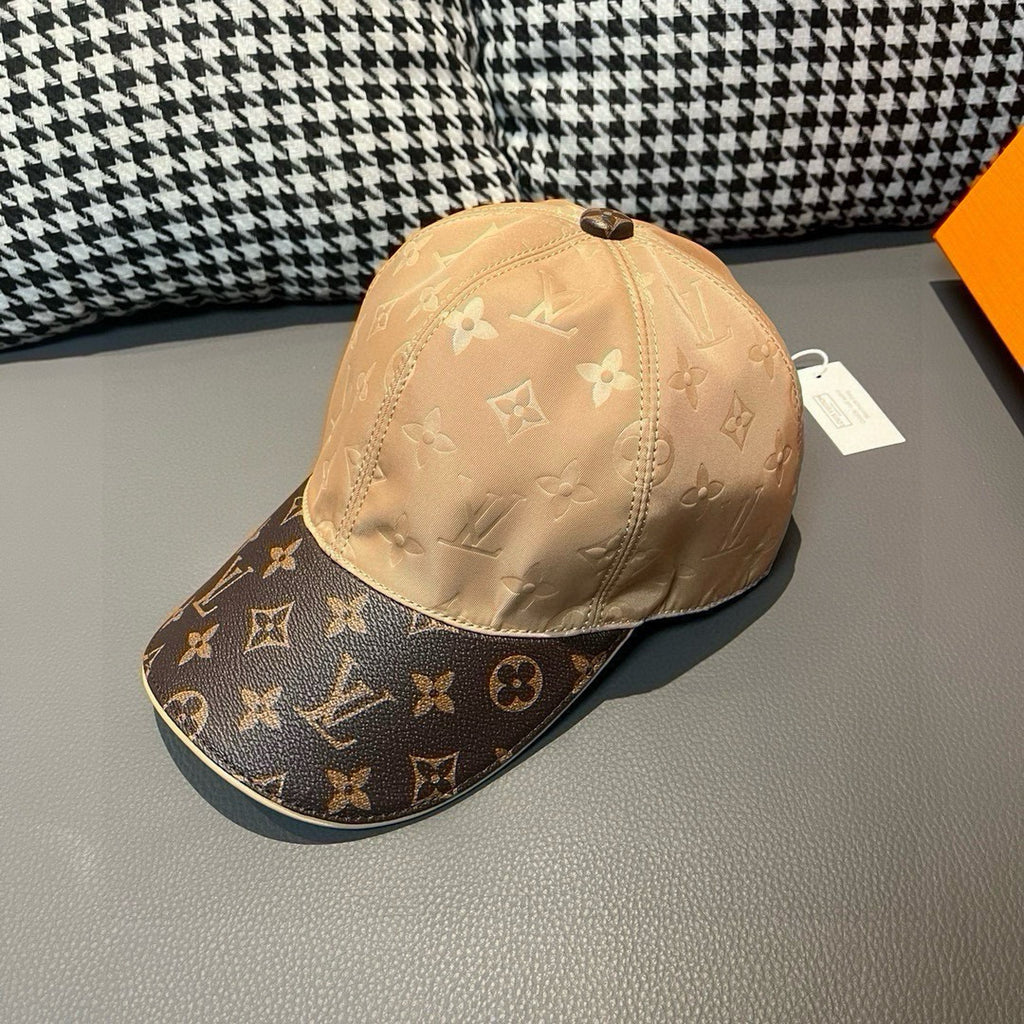Beige monogram baseball cap with dark logo brim, side view