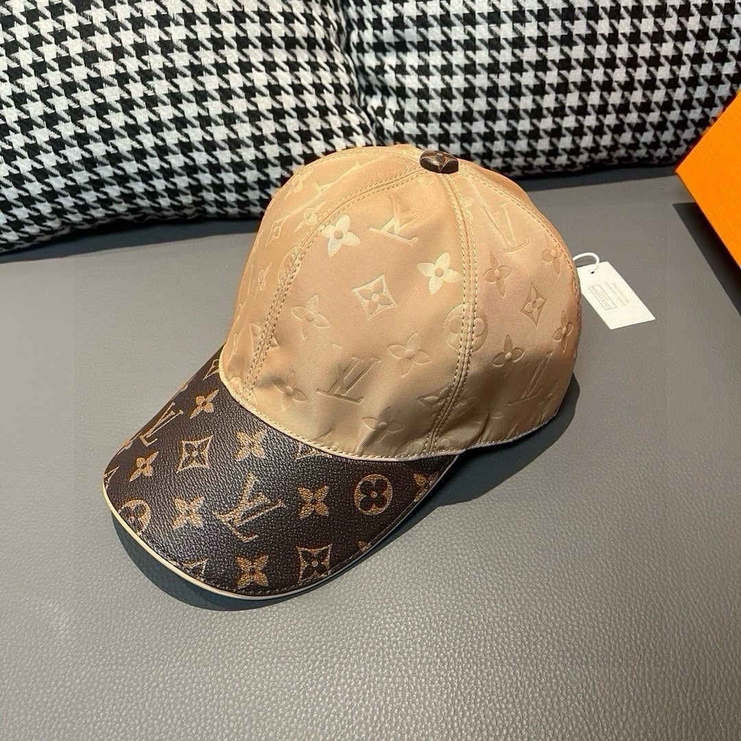 Beige monogram baseball cap with dark logo brim, side view