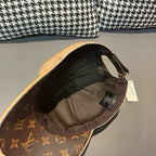 Beige and dark brown monogram baseball cap interior view with tag