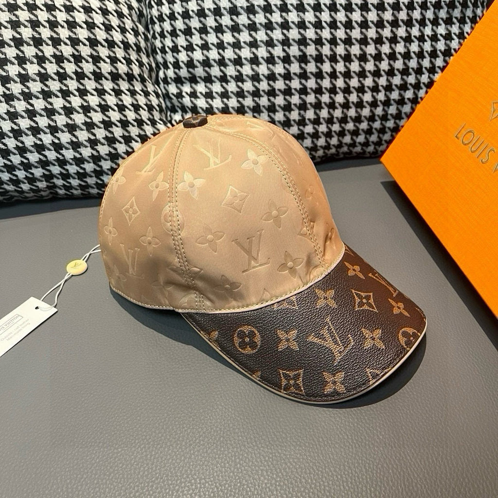 Beige and dark brown monogram baseball cap, angled front view