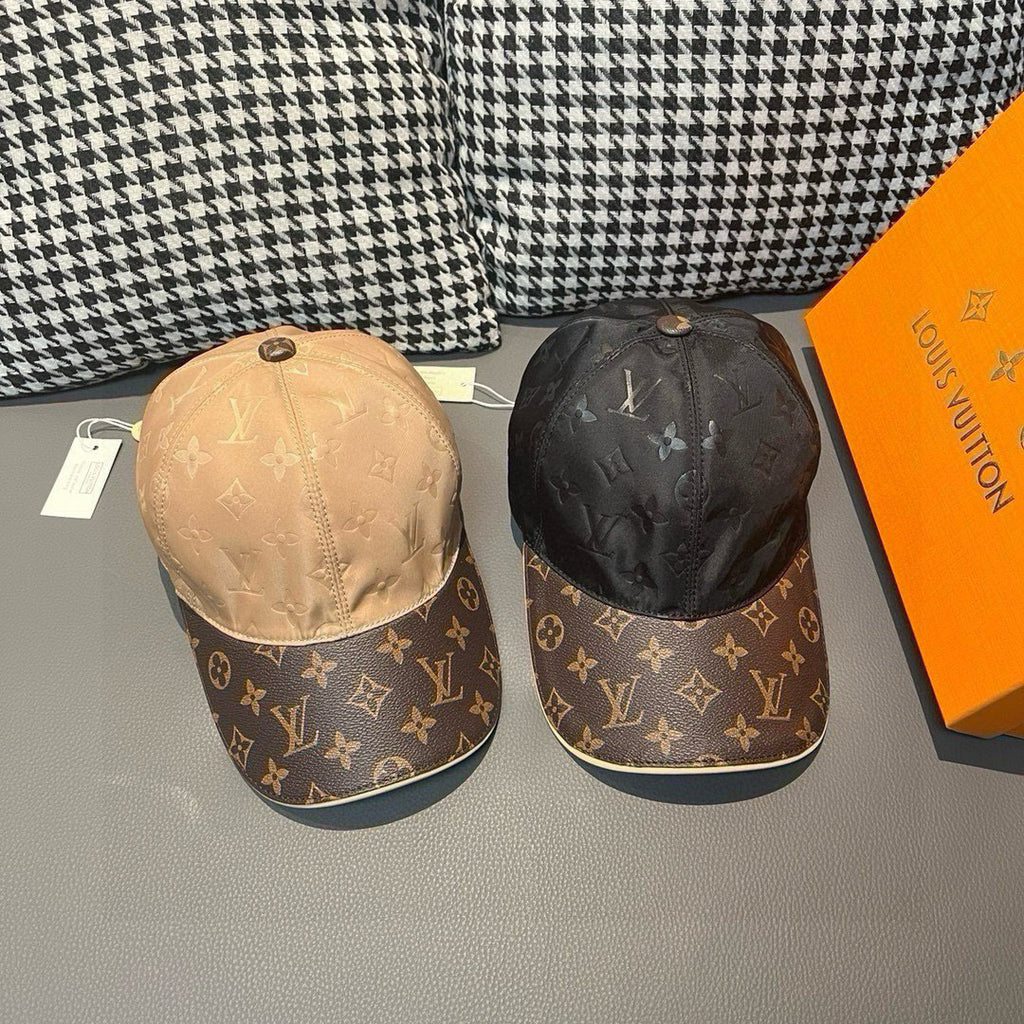 Pair of monogram baseball caps, beige and black with dark logo brims