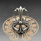 Chrome flower-shaped accessory with pointed petals and round center bead