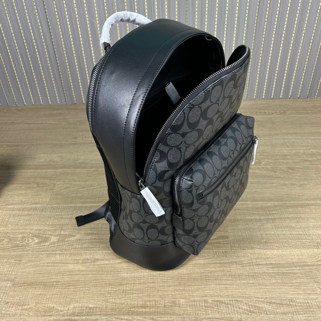 Coah backpack side view with zipper opening, patterned front panel, and black trim