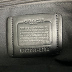 Coah backpack leather brand patch with authentication text and serial number
