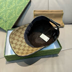 Gucci monogram baseball cap with black interior lining, shown open