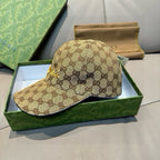 Gucci monogram baseball cap with curved brim and dark underside