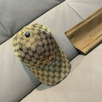 Gucci monogram baseball cap with round metal button on the crown