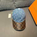 Louis Vuitton denim cap with blue monogram print and dark patterned under brim