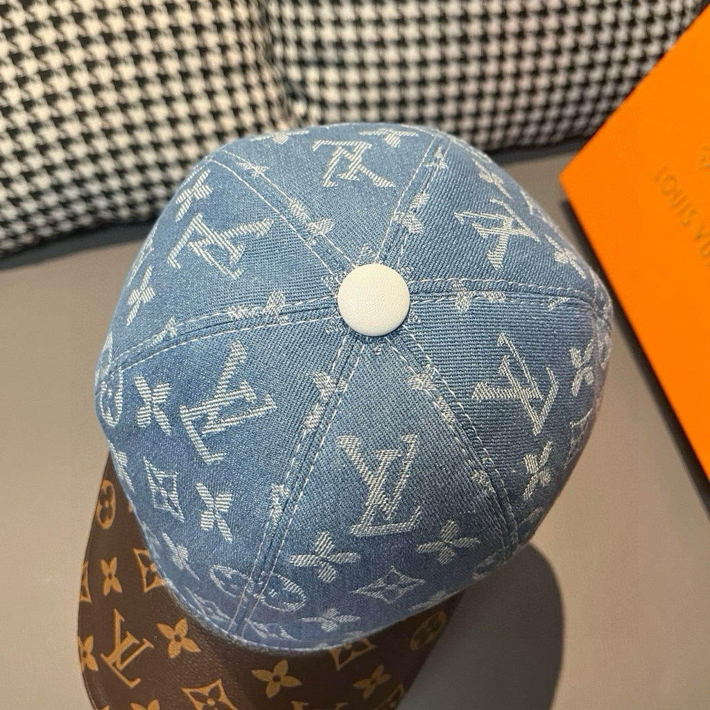 Louis Vuitton denim cap top view with blue monogram pattern and white snap button