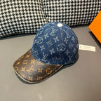 Blue monogram baseball cap with brown patterned brim, side view