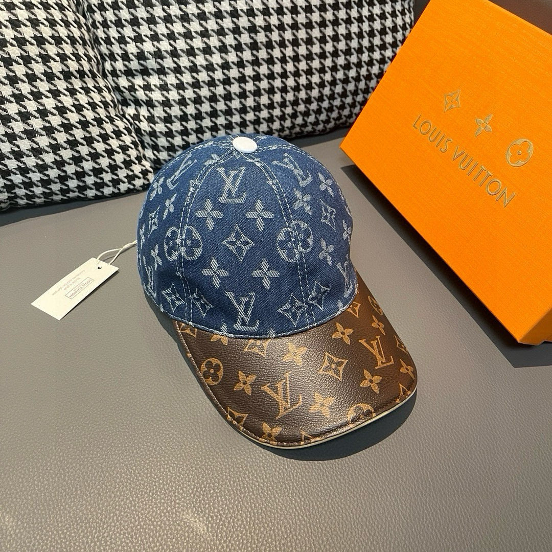 Blue and brown monogram baseball cap with curved brim and small button on top