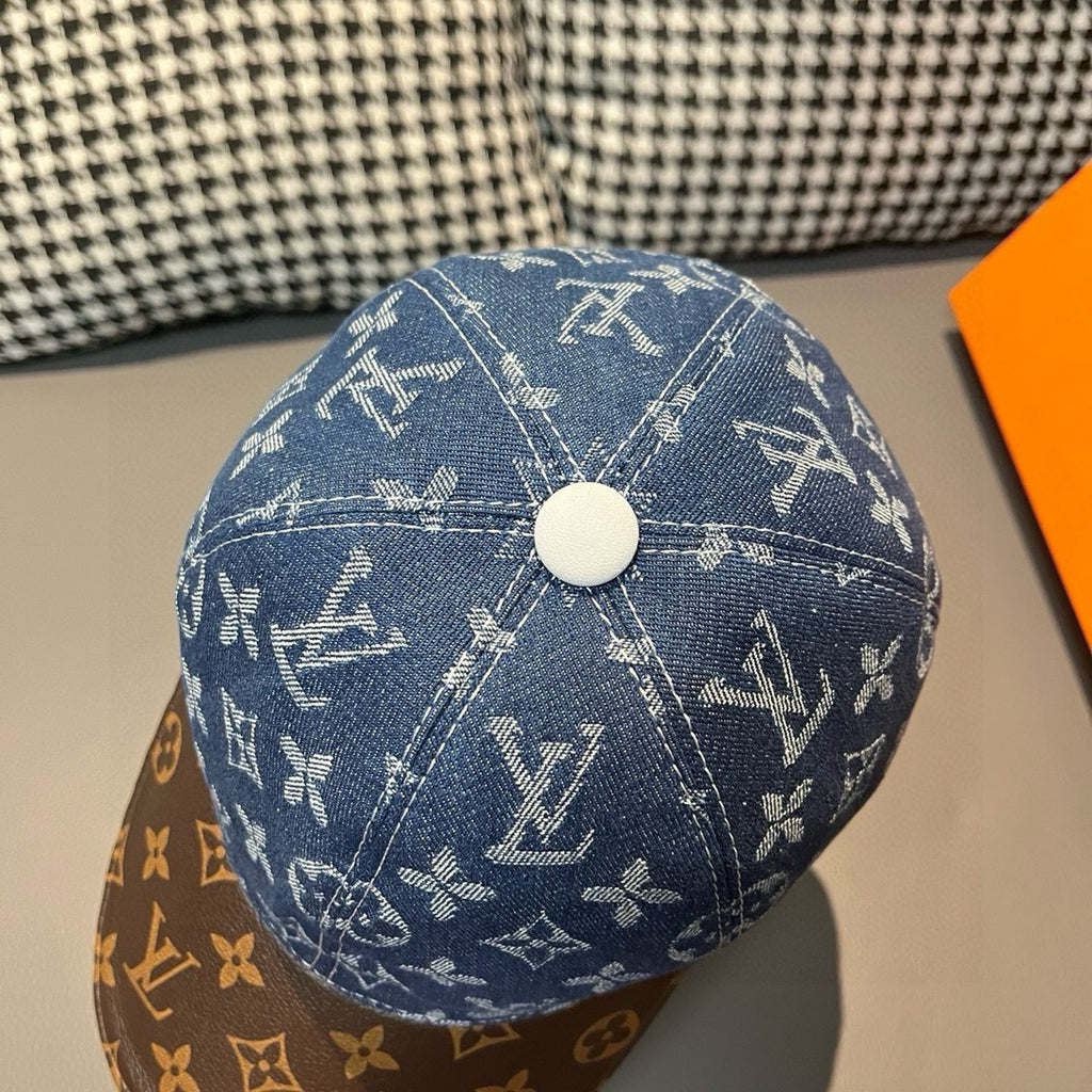 Blue monogram baseball cap with round light button on top
