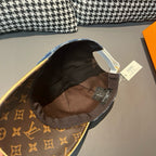 Inside of monogram baseball cap, showing brown interior lining