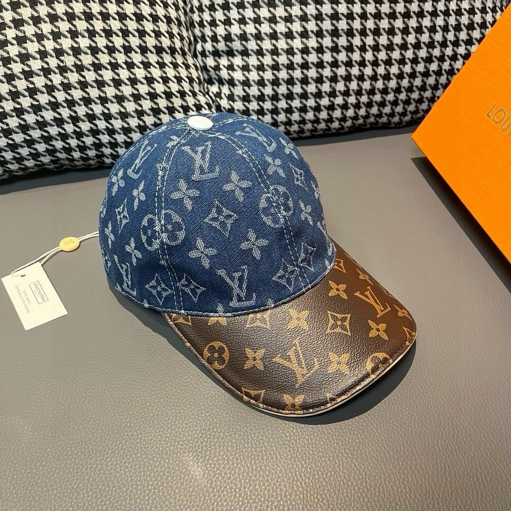 Blue monogram baseball cap with brown brim and gold-trim stitching