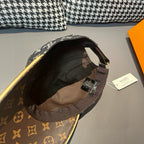 Louis Vuitton monogram cap with dark underside and brown brim, interior view