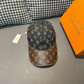 Louis Vuitton monogram cap with dark top and brown patterned brim, front view