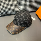 Louis Vuitton monogram cap with dark crown and brown brim, angled view