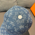 Denim baseball cap top with blue monogram pattern and round button