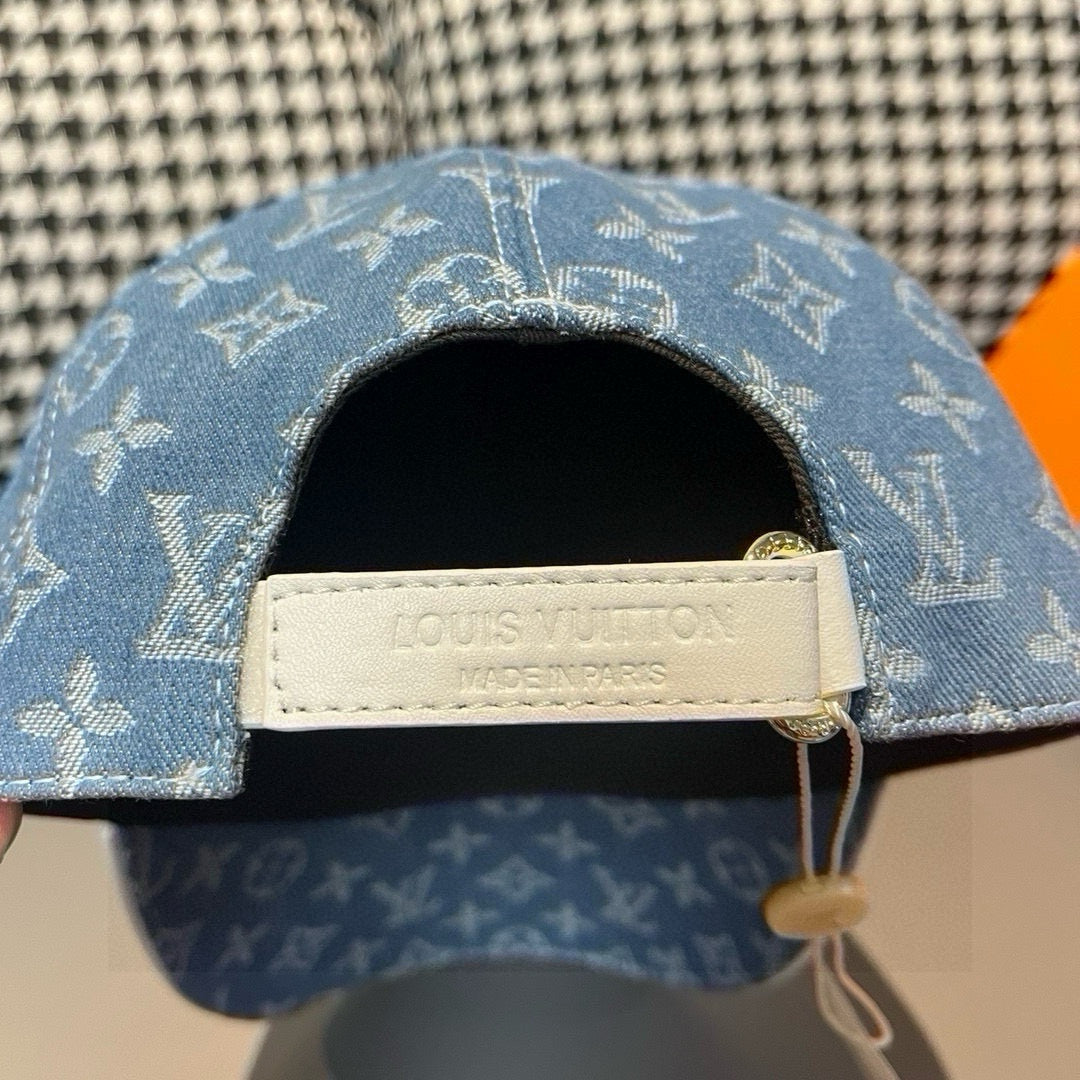 Louis Vuitton logo patch on denim cap inner band, dark underside