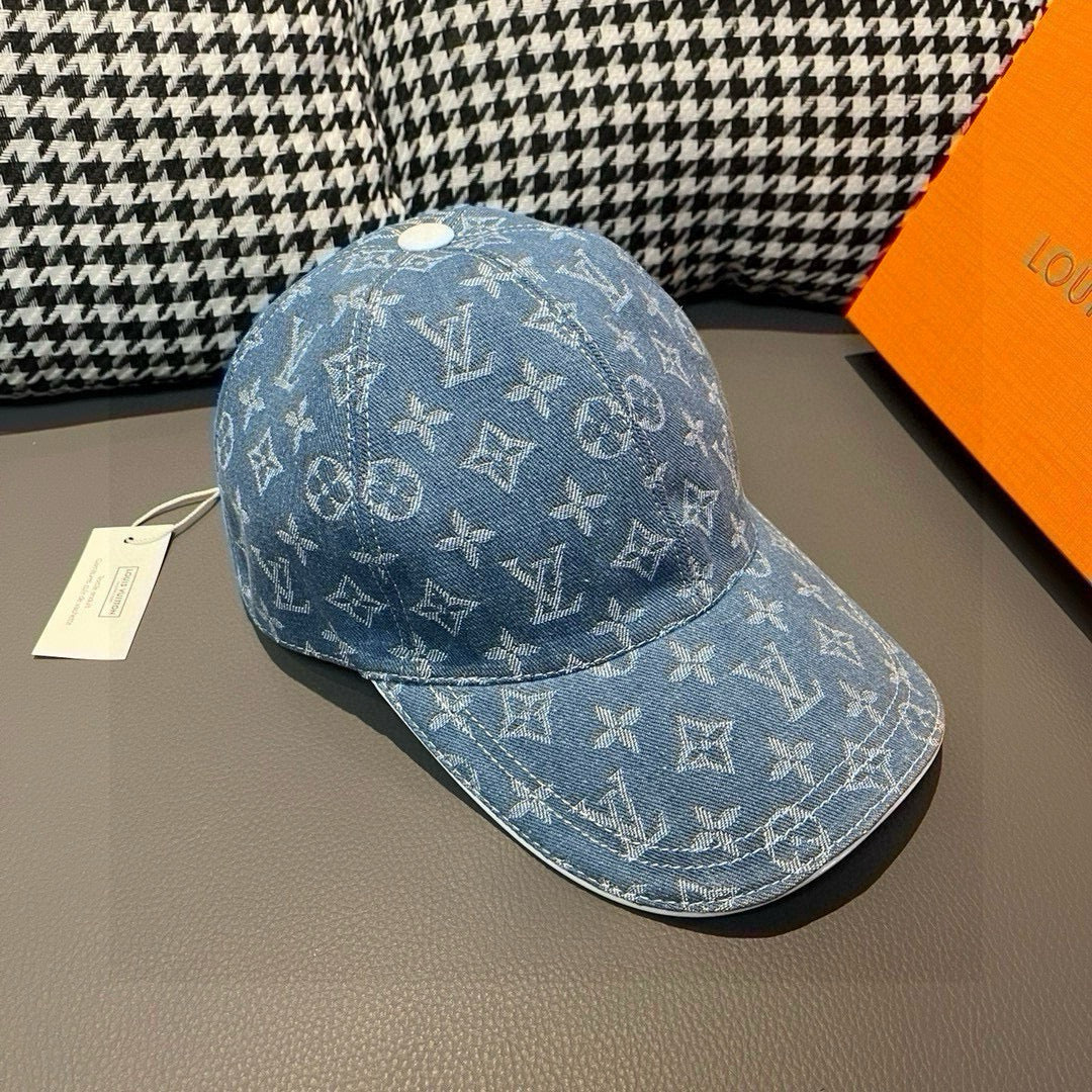 Denim baseball cap angled view with blue monogram pattern and curved brim