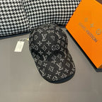 Louis Vuitton monogram baseball cap, black with repeating pattern, side view