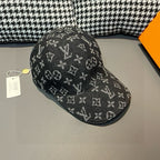 Louis Vuitton monogram baseball cap, black with repeating pattern, curved brim front
