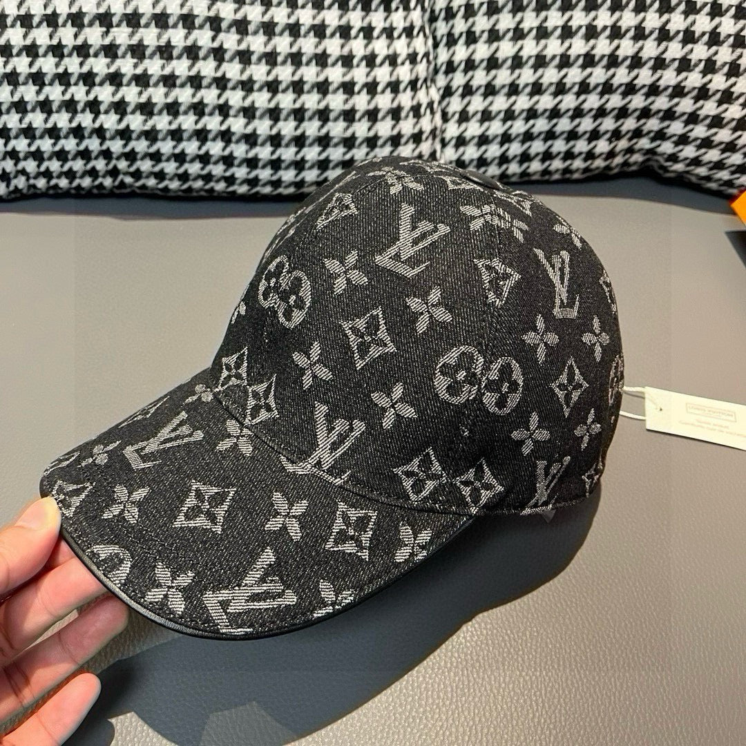 Louis Vuitton monogram baseball cap, black with repeating logo print, close front view