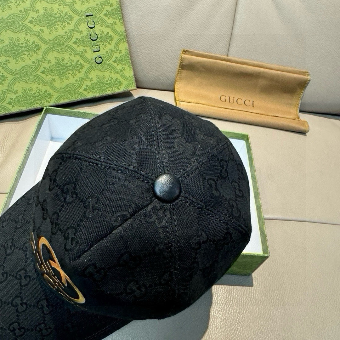 Black Gucci cap with GG monogram fabric and round top button detail