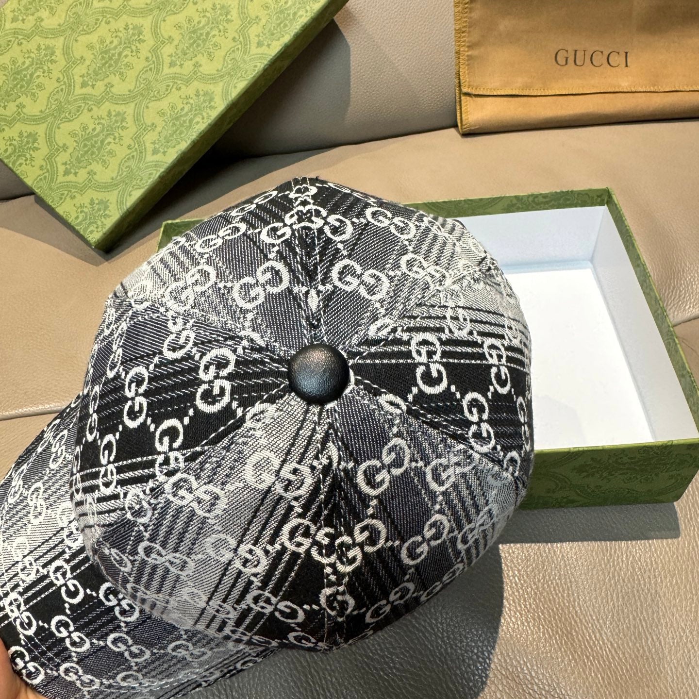 Gucci GG-print cap with black button detail, black and white, curved brim