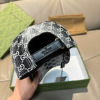 Gucci GG-print cap with adjustable leather strap and buckle, black and white