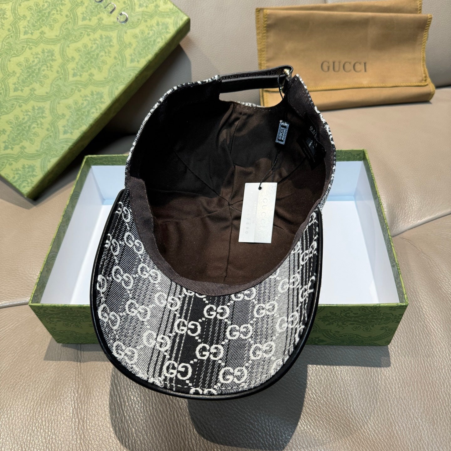Gucci GG-print baseball cap, inner lining visible, black and white