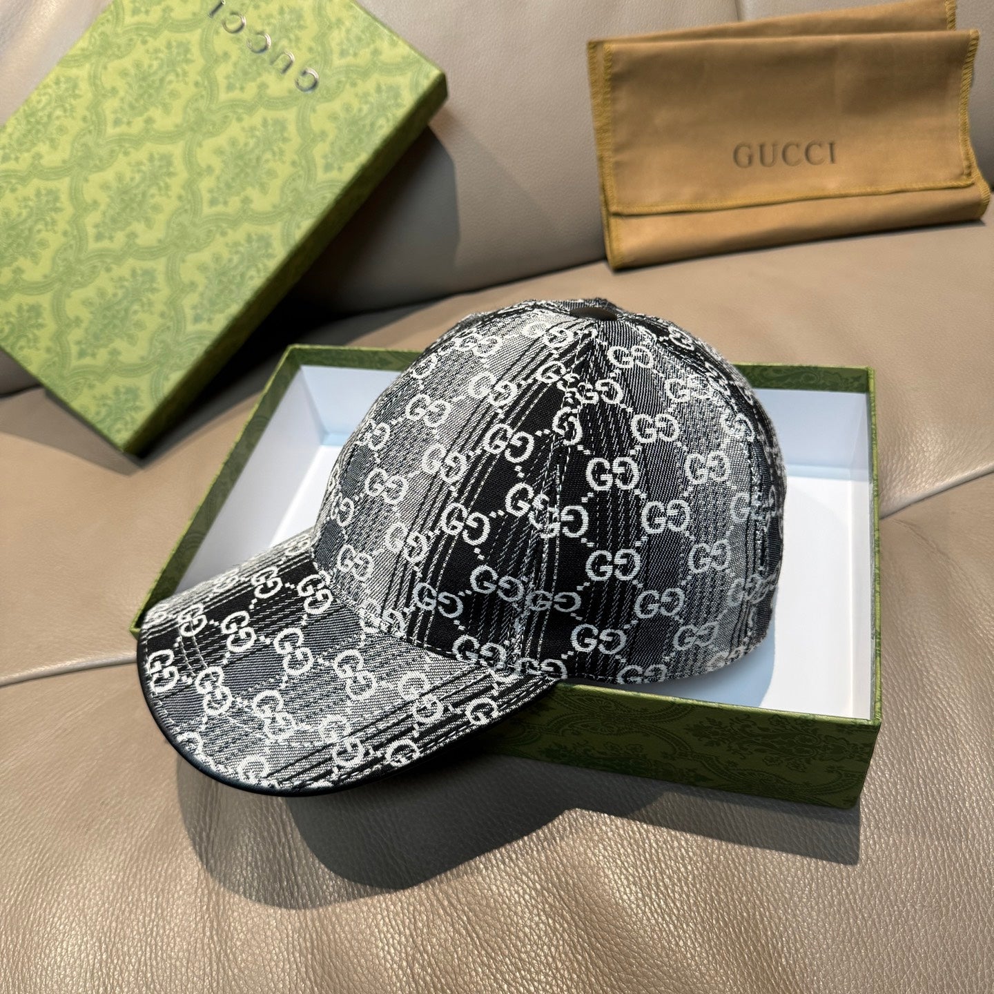 Gucci GG-print baseball cap, side view, black and white, curved brim