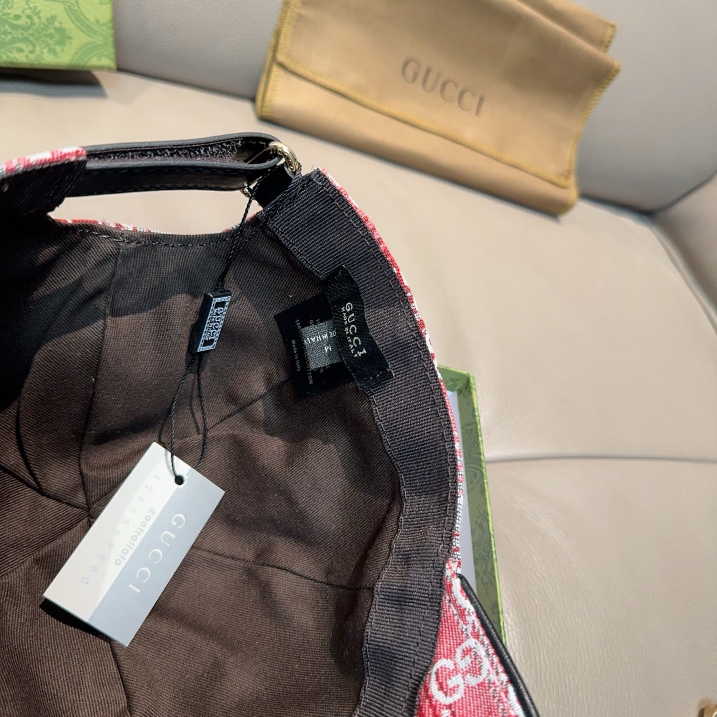 Gucci baseball cap interior close-up with black mesh and size tag