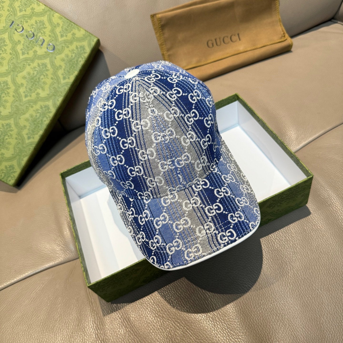 Gucci blue GG monogram baseball cap with white trim and curved brim