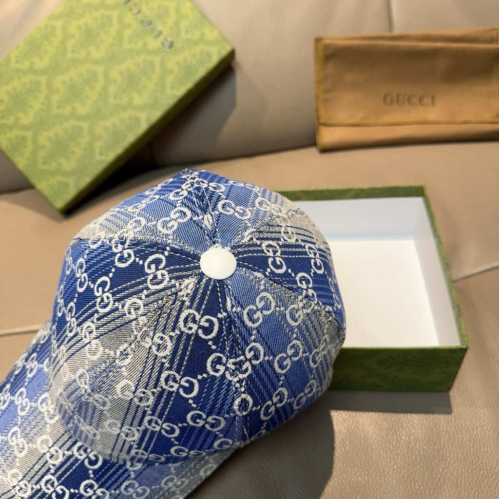 Gucci blue GG monogram baseball cap with round white button on top