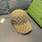Gucci cap in tan GG canvas with red-and-white stripe on the side