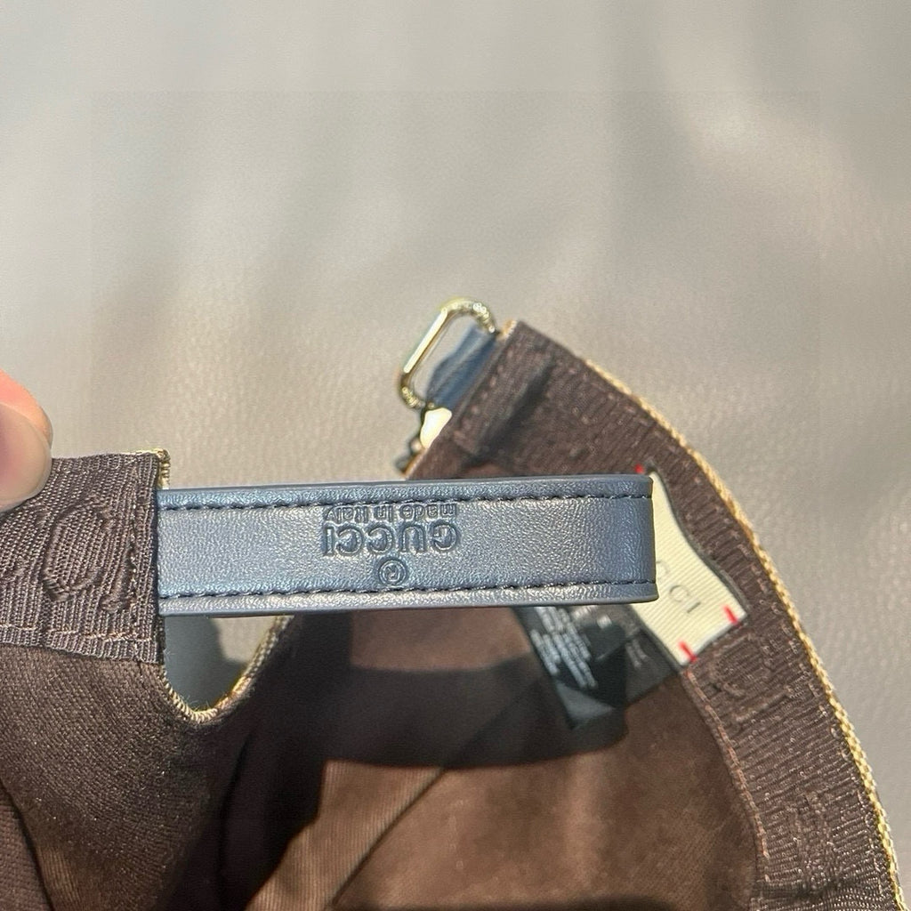 Gucci cap interior label on dark brim lining with adjustable strap