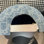 Dior cap adjustable strap close-up with light label and stitched strap end