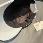 Dior cap interior view with black lining, fabric seam, and hanging size/brand tags